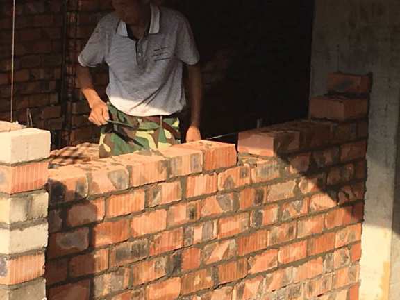 建筑工程砌体工程质量通病及防治措施-干砖上墙 建筑工程砌体工程质量通病及防治措施-干砖上墙